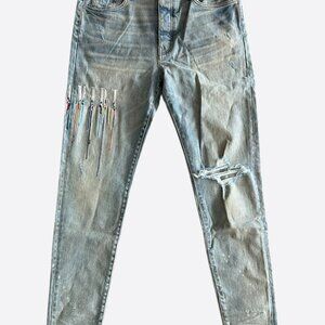 Amiri Clay Indigo Paint Drip Logo Jeans